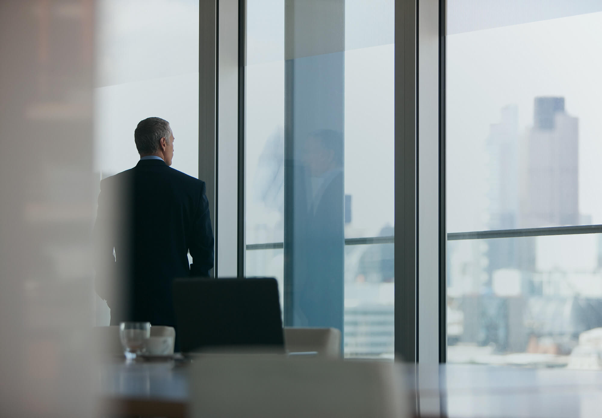 man standing looking out